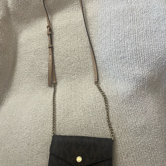 Michael Kors Handbags - Michael Kors Black Crossbody Bag with Gold Chain Design